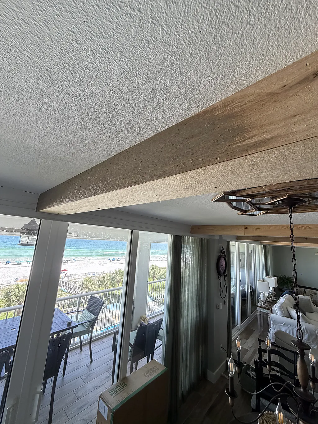 Ceiling opened up around a partly fitted timber beam before finishing and repainting
