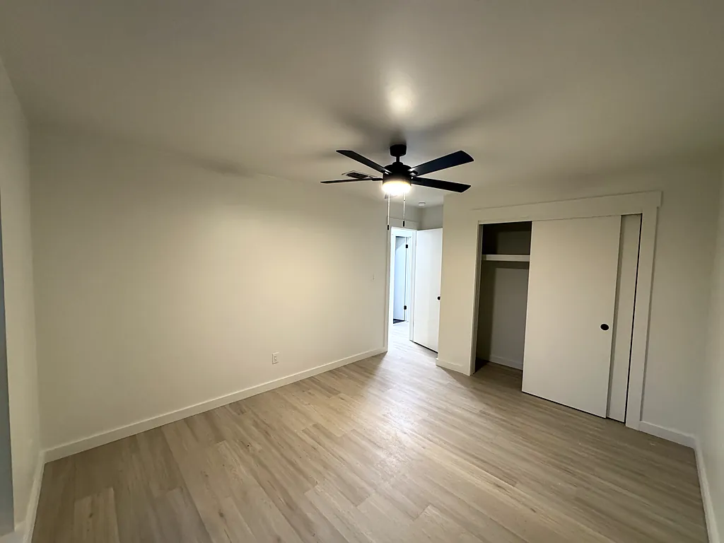 Empty room in Destin, Florida with freshly painted walls, ceiling and trim