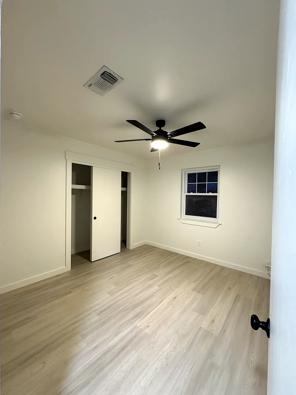 Repainted interior walls, closet doors and window trim in a Destin, Florida home